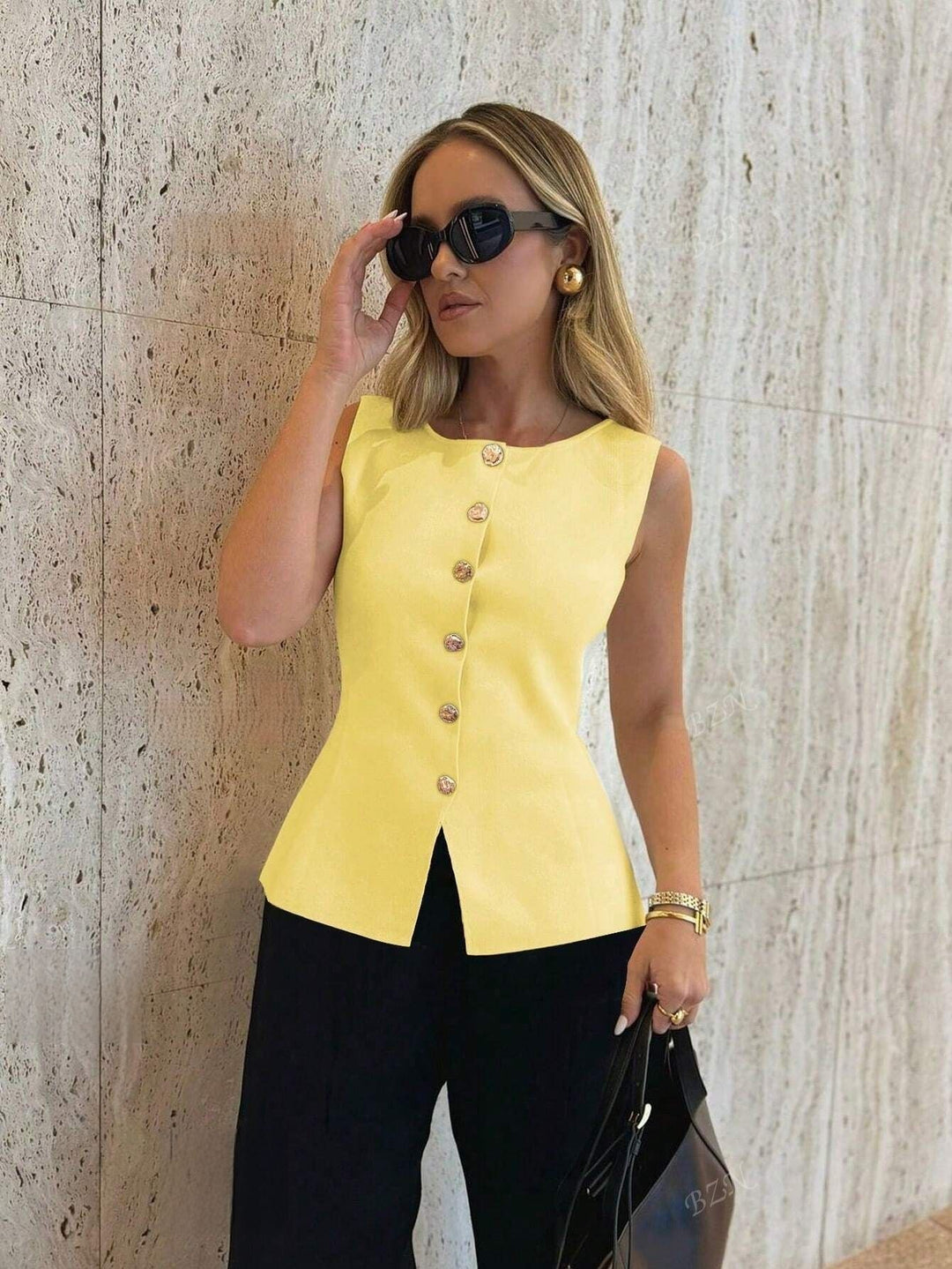Grier | Sleeveless Peplum Top